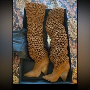 Brand new Yves Saint Laurent boots. New with tabs and in original box.Size 38